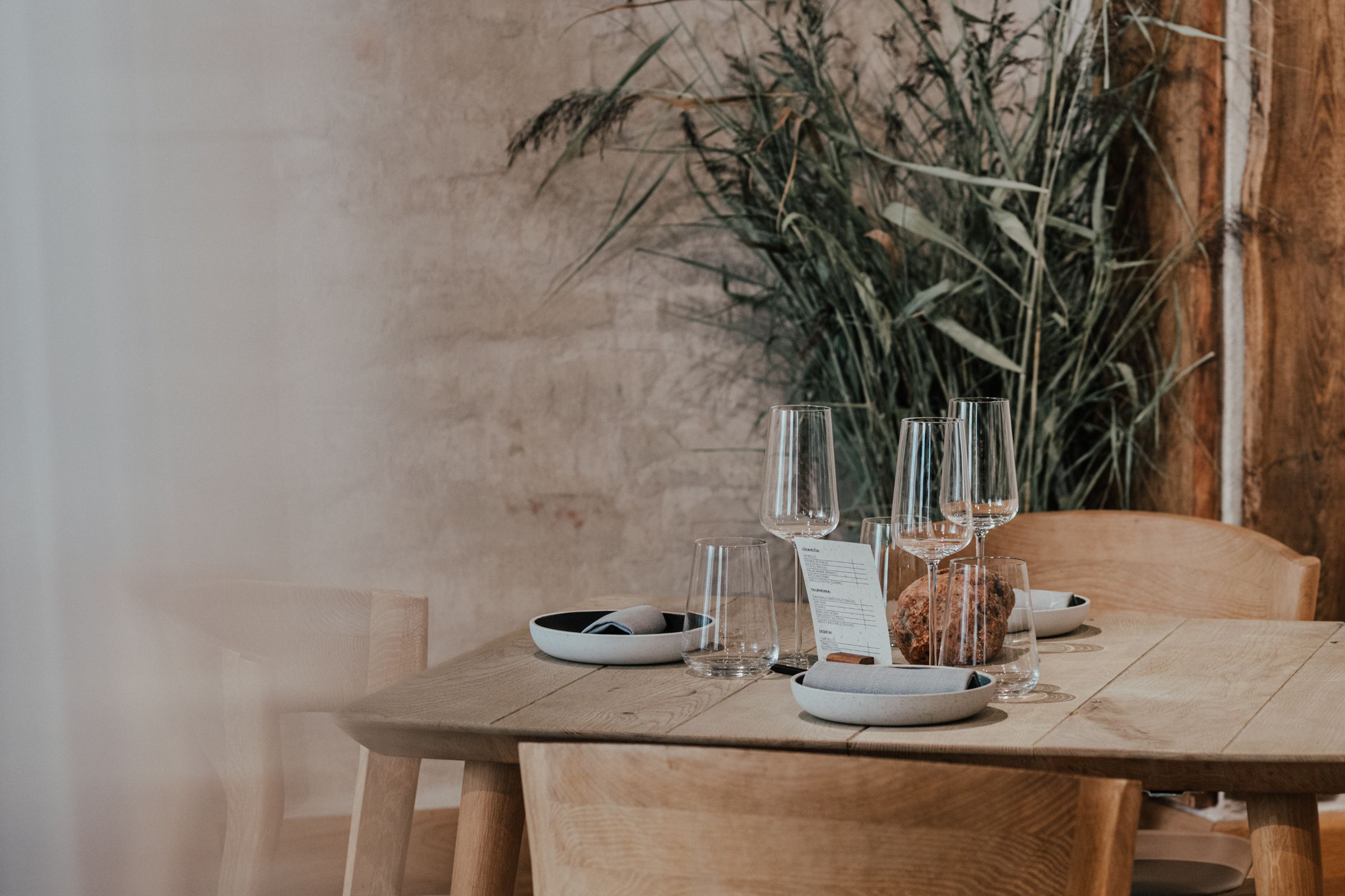 A table by the window in the dining room at 14 Horses