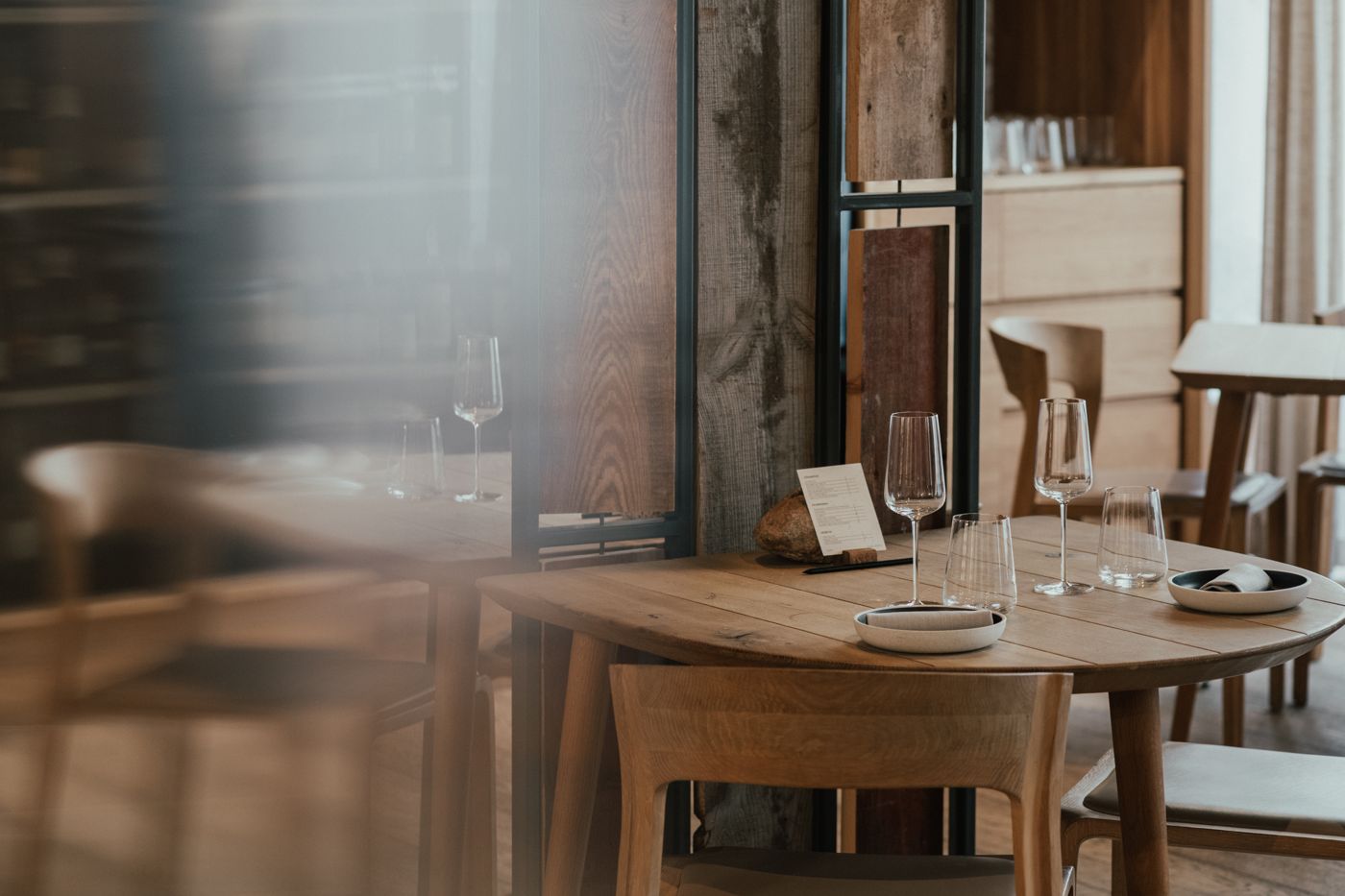 Wine glasses on an oak table
